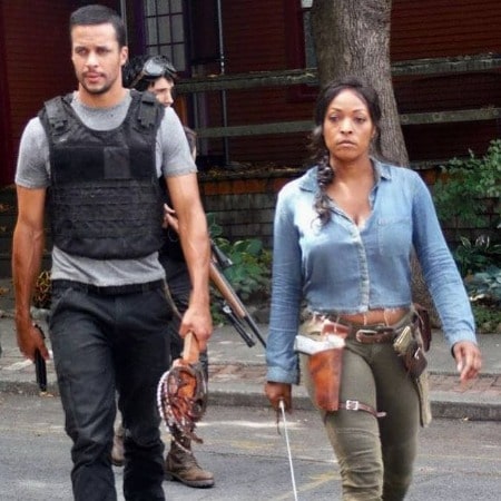 Picture of Kellita Smith with her co-actor shooting a scene of the series 
